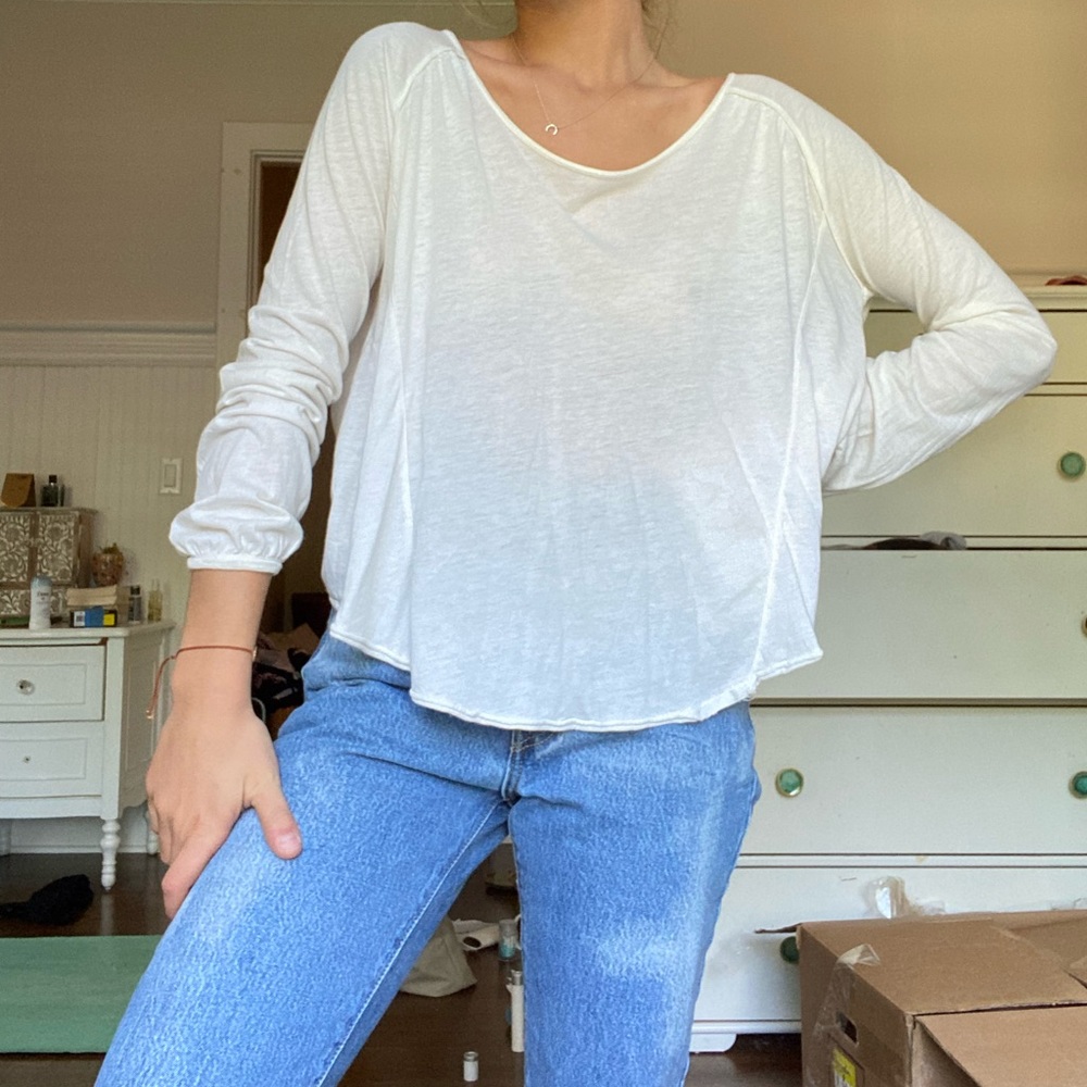 White open-back shirt